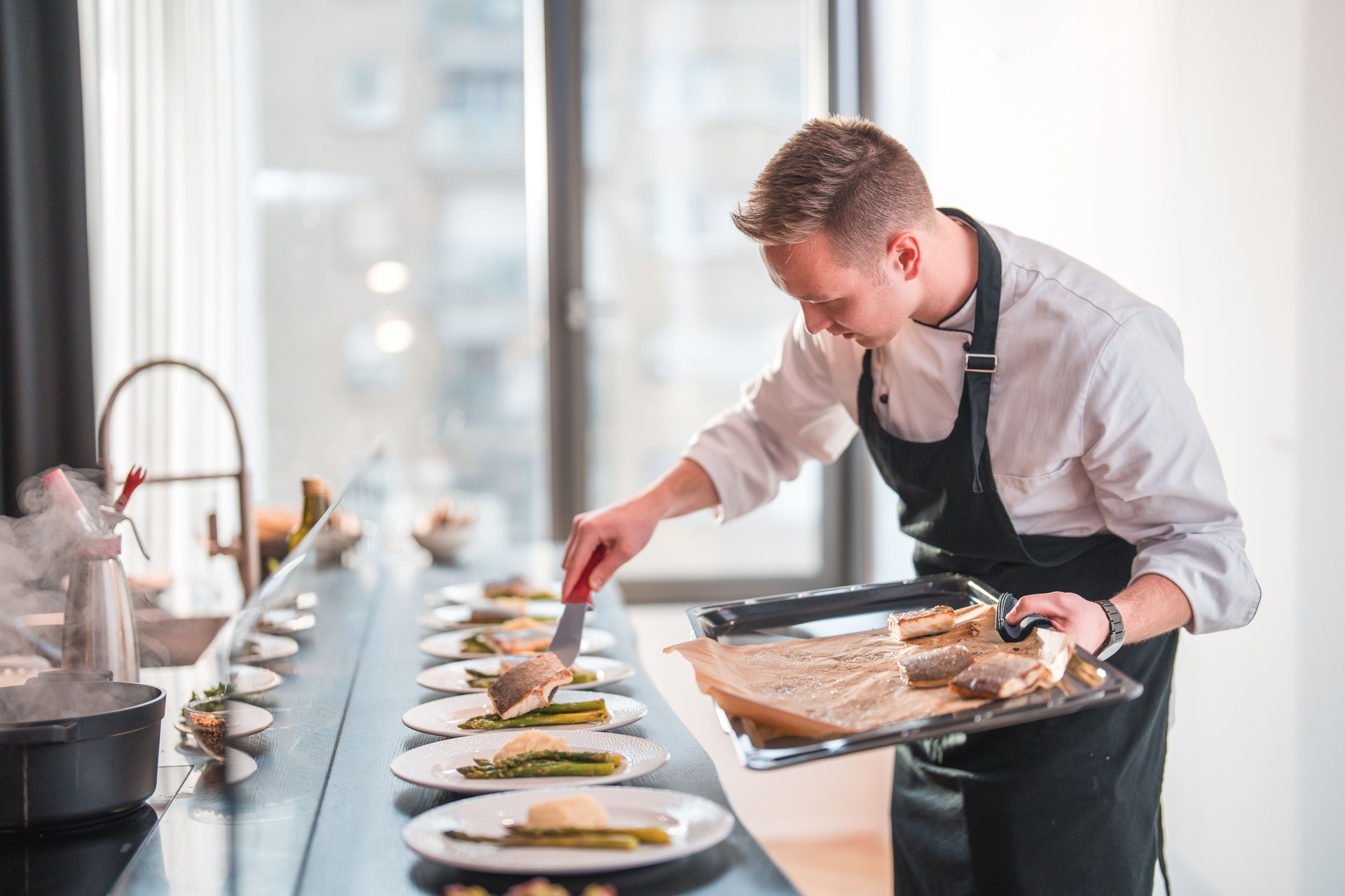 Skilled Chef Serving Culinary Masterpieces